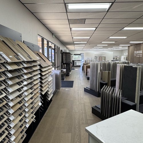 Hardwood flooring and LVP samples at Pioneer Floor Coverings