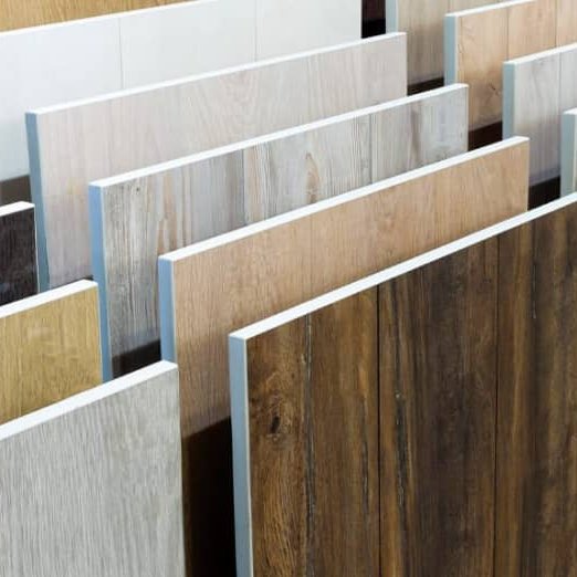 LVP flooring samples in a bright showroom