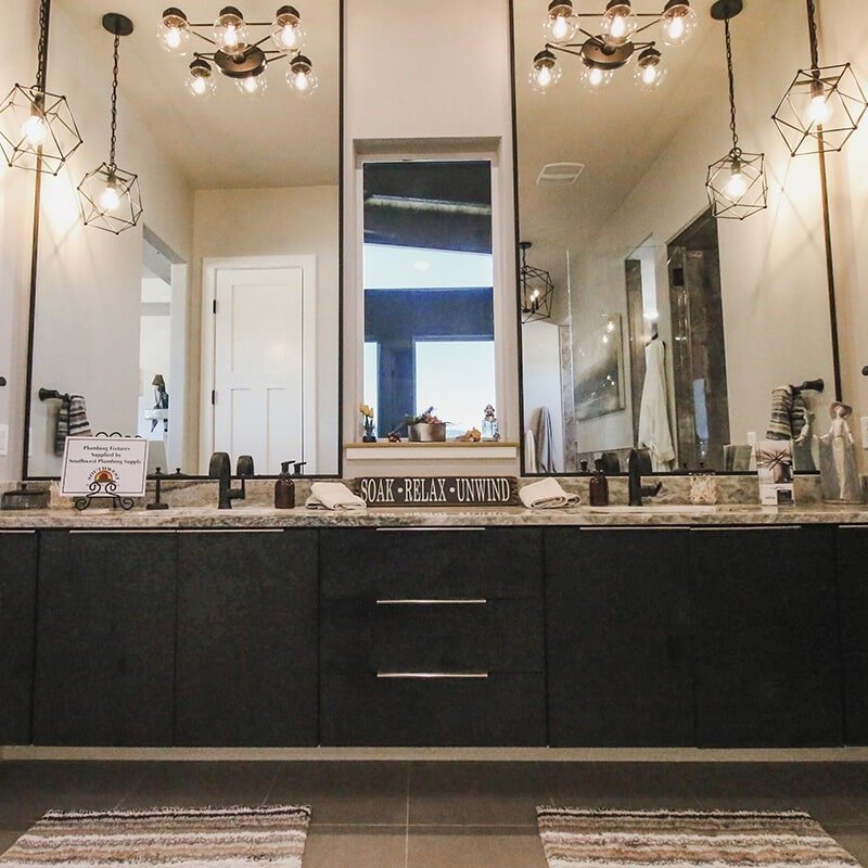 Custom floating vanity at 'Elements at Sunset' from Pioneer Floor Coverings & Design